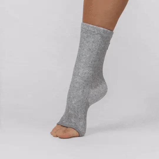 Open-toe bamboo ankle support worn on a bare foot