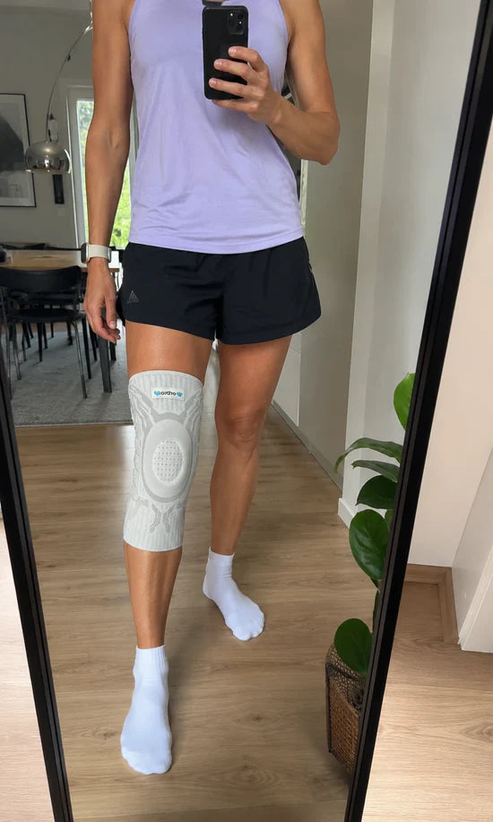 Customer Claudia S. wearing the knee support
